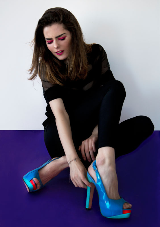 Woman with crazy, colorful shoes